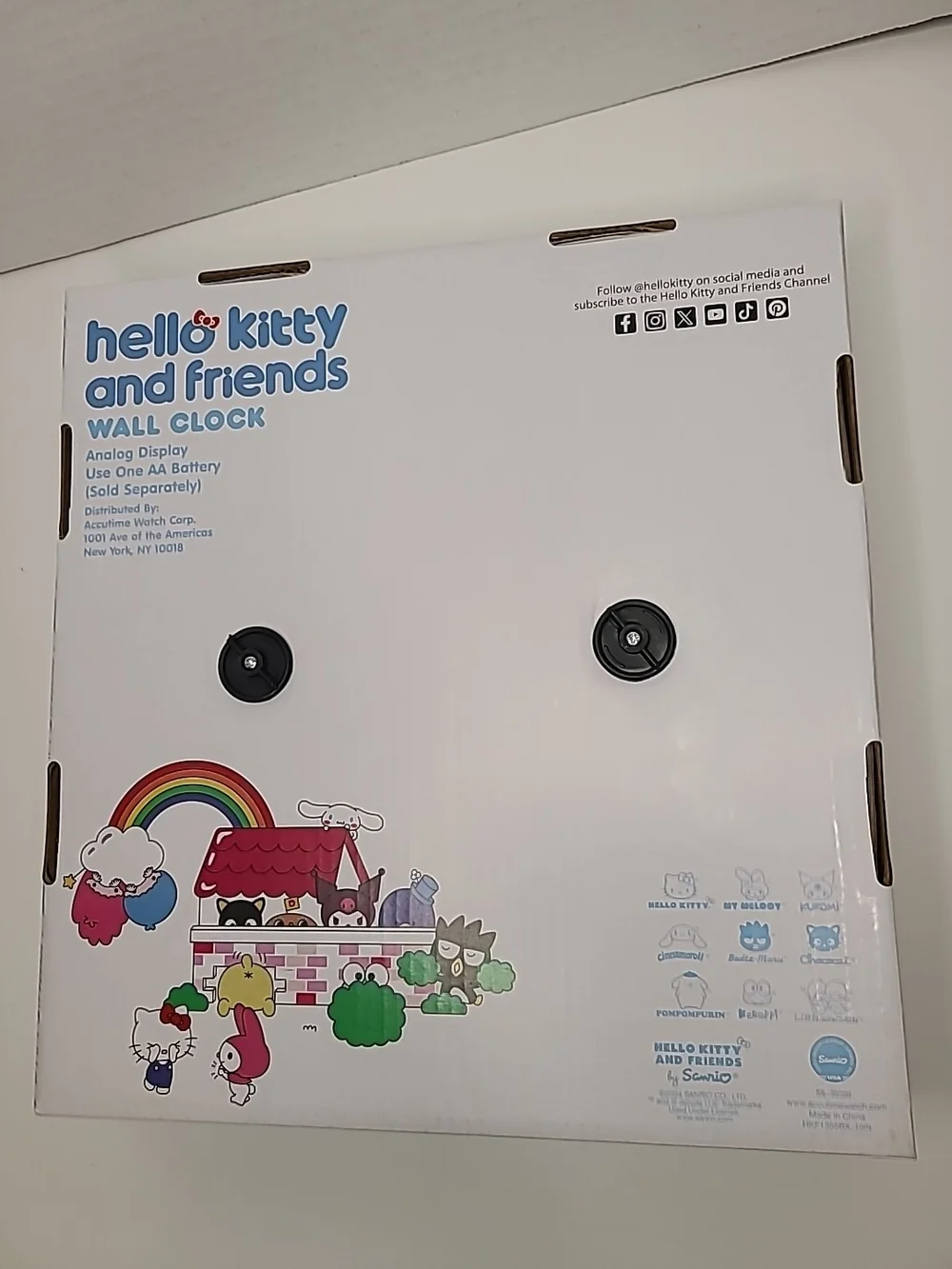 Hello Kitty Blue and Red Logo Wall Clock Packaging